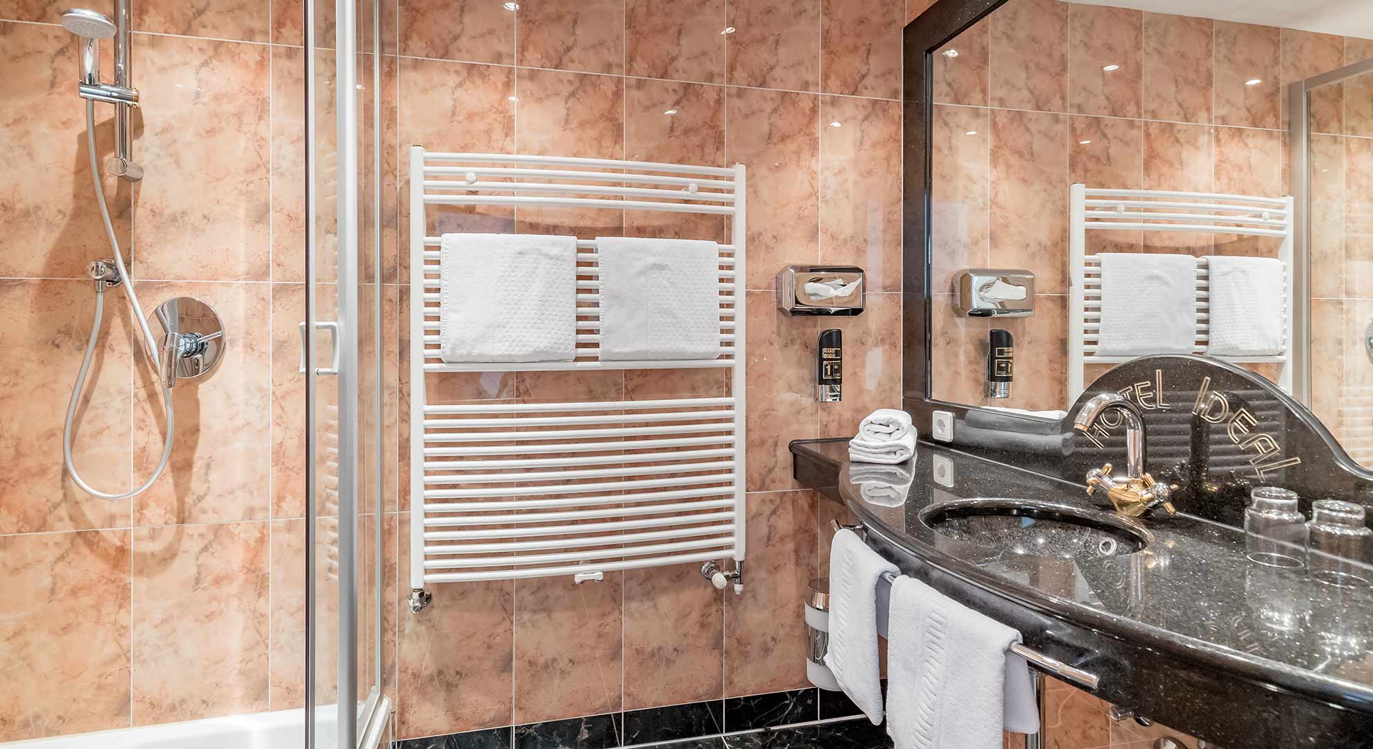 Luxury bath room is equipped with marble tiles